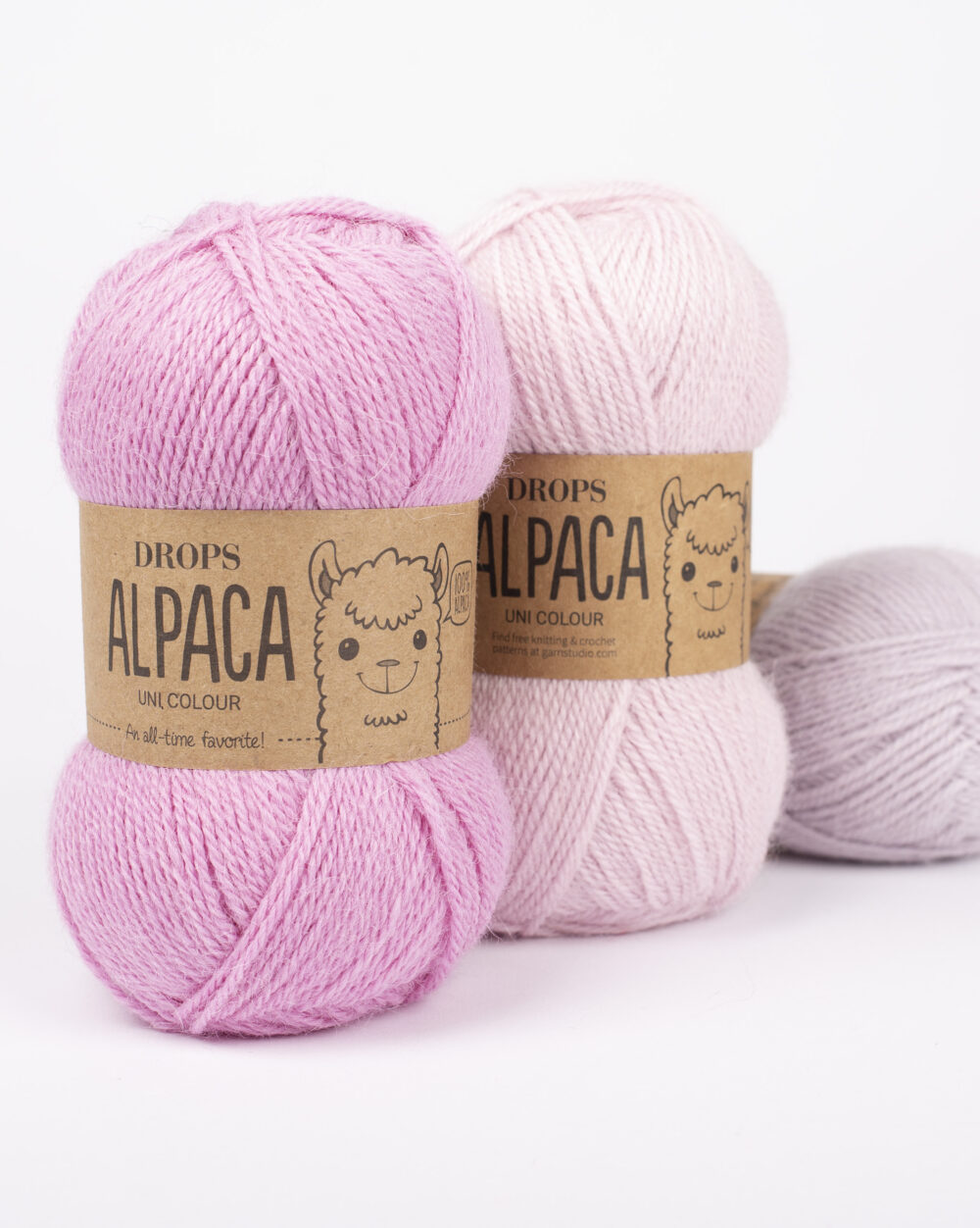 Drops Alpaca mezgimo siulai - alpakos siulai - ploni siulai - naturalios sudeties siulai siulai kudikiams, vaikams - siulai naujagimiui - naujagimio megztoms kojinems - ekologiski siulai - svelnus alpakos vilnos siulai - zieminiai siulai - siuludama - rožinės spalvos alpakos siulai