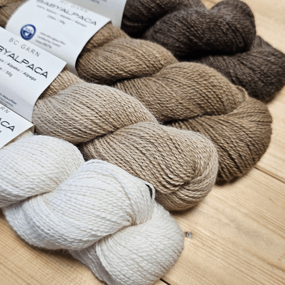 BC Garn BabyAlpaca 100% jaukikliu alpakos vilnos siulai ploni siulai mezgimui mezgimo siulai naturalus sulai kokybiska vulna ekologiska alpacos vilna RAS Siulu dama siulai vaikams megztukams skaroms kepurems